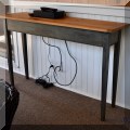 F19. Narrow pine console table with painted legs. 30"h x 47"w x 14"d 